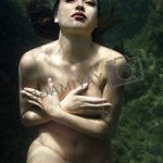 Nude woman underwater. by iofoto Vectors Illustrations with Unlimited Downloads