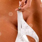 Naked Girl Holding White Panties Stock Photo