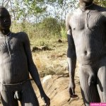 African surma tribe boy in naked