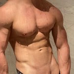 Muscle boy in the shower