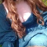 Redhead beauty squirts outside