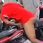 Half-naked man has sex with his MOTORBIKE in broad daylight in front of stunned onlookers in shocking video