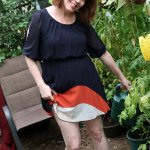 Naughty mature Brie loves getting her pussy done in her garden