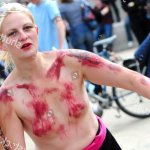 Naked Female Cyclist Red Paint Editorial Stock Photo