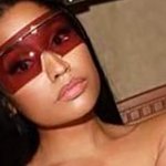 Nicki Minaj Poses Topless Jokes Shes a Stripper
