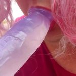Chub trans sucks dildo walking down a public street!
