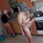 Amateur couple having fun naked in the kitchen
