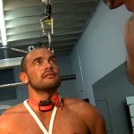Two muscle guys get into forced workout action with a shock collar